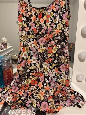 Large Floral Romper in Black with Multi-Color Flowers